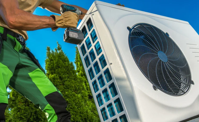hvac technician opening the cover of heat pump 1